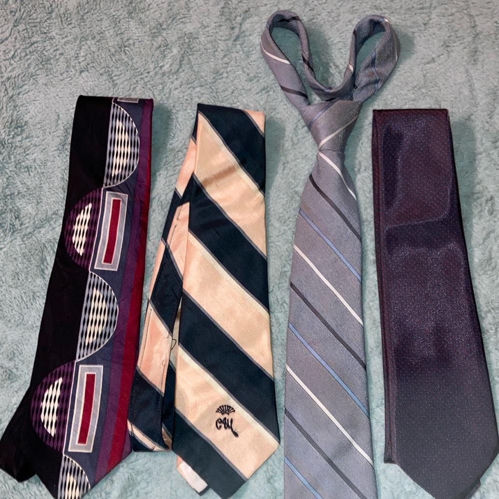 Bundle of 4 men’s neckties, various sizes and materials.           $15